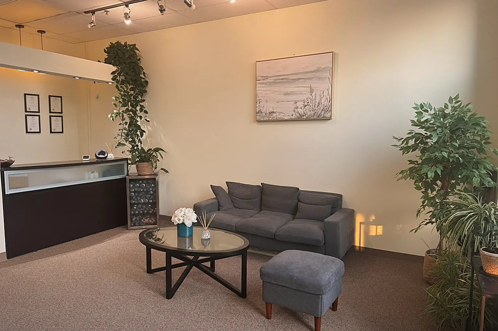 Waiting lounge at Day Massage in Chaska, Minnesota, with seating and warm low lighting
