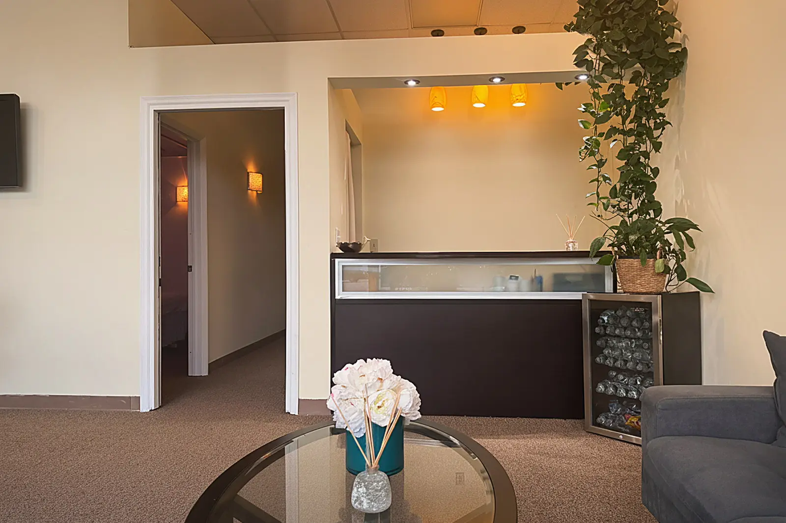 Front desk and hallway to the treatment rooms at Day Massage in Chaska Commons
